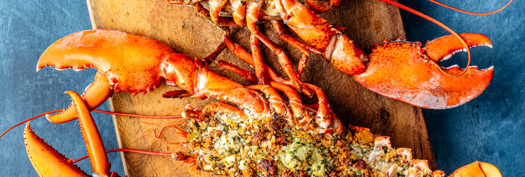 Whole Stuffed Maine Lobster with Herby Artichoke Pancetta Bread Crumbs recipe image